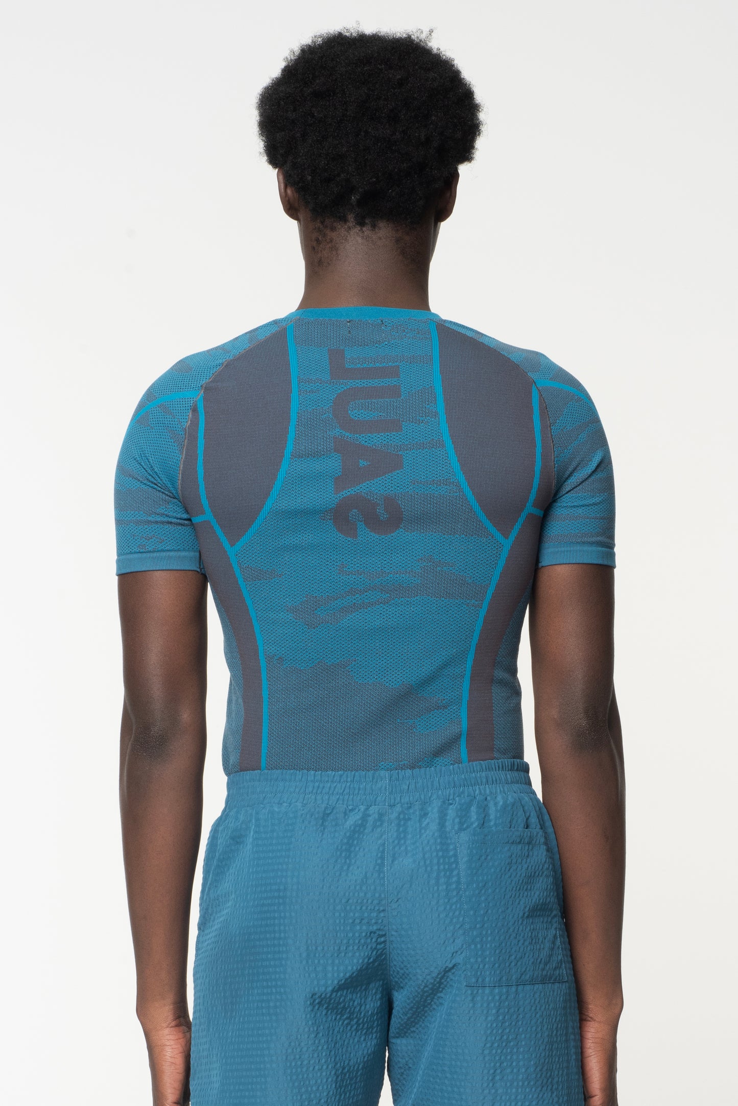 INDIAN OCEAN SHORT SLEEVE SEAMLESS KNIT COMPRESSION - TEAL/ANTHRACITE